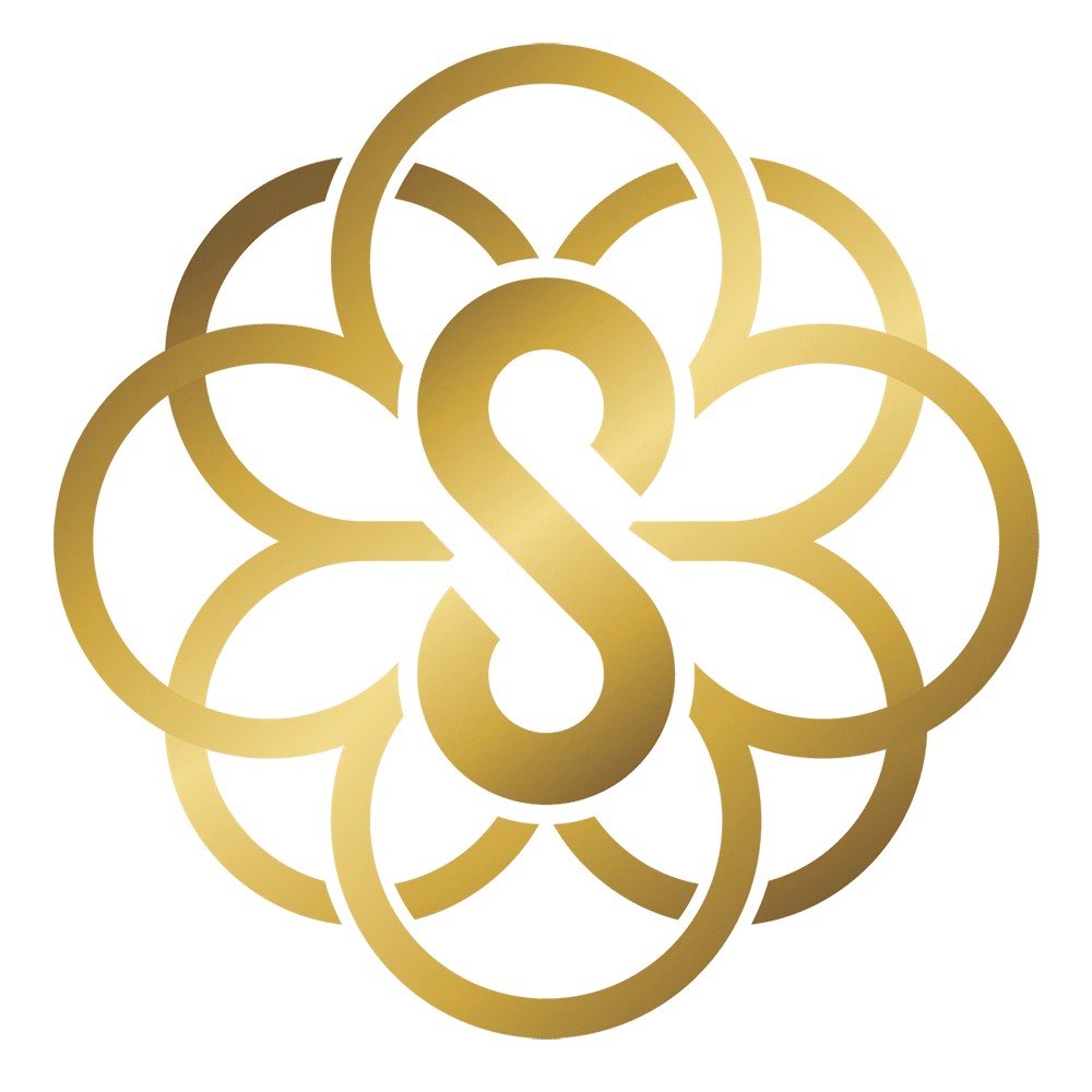 Sage Seeds logo featuring a stylized golden "S" surrounded by floral elements, representing a cannabis dispensary focused on community events and responsible usage.